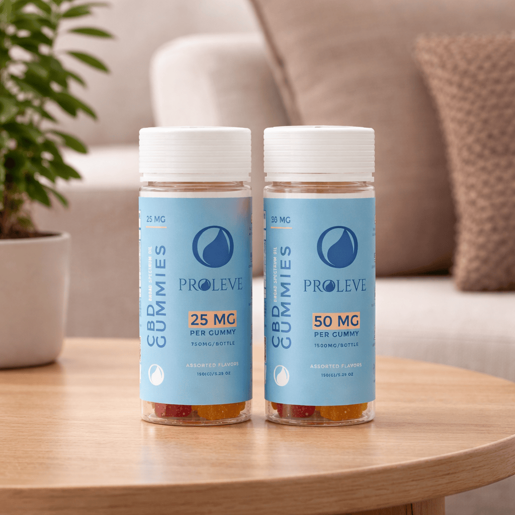 Two bottles of Proleve CBD Gummies on a wooden table with a blurred indoor background.